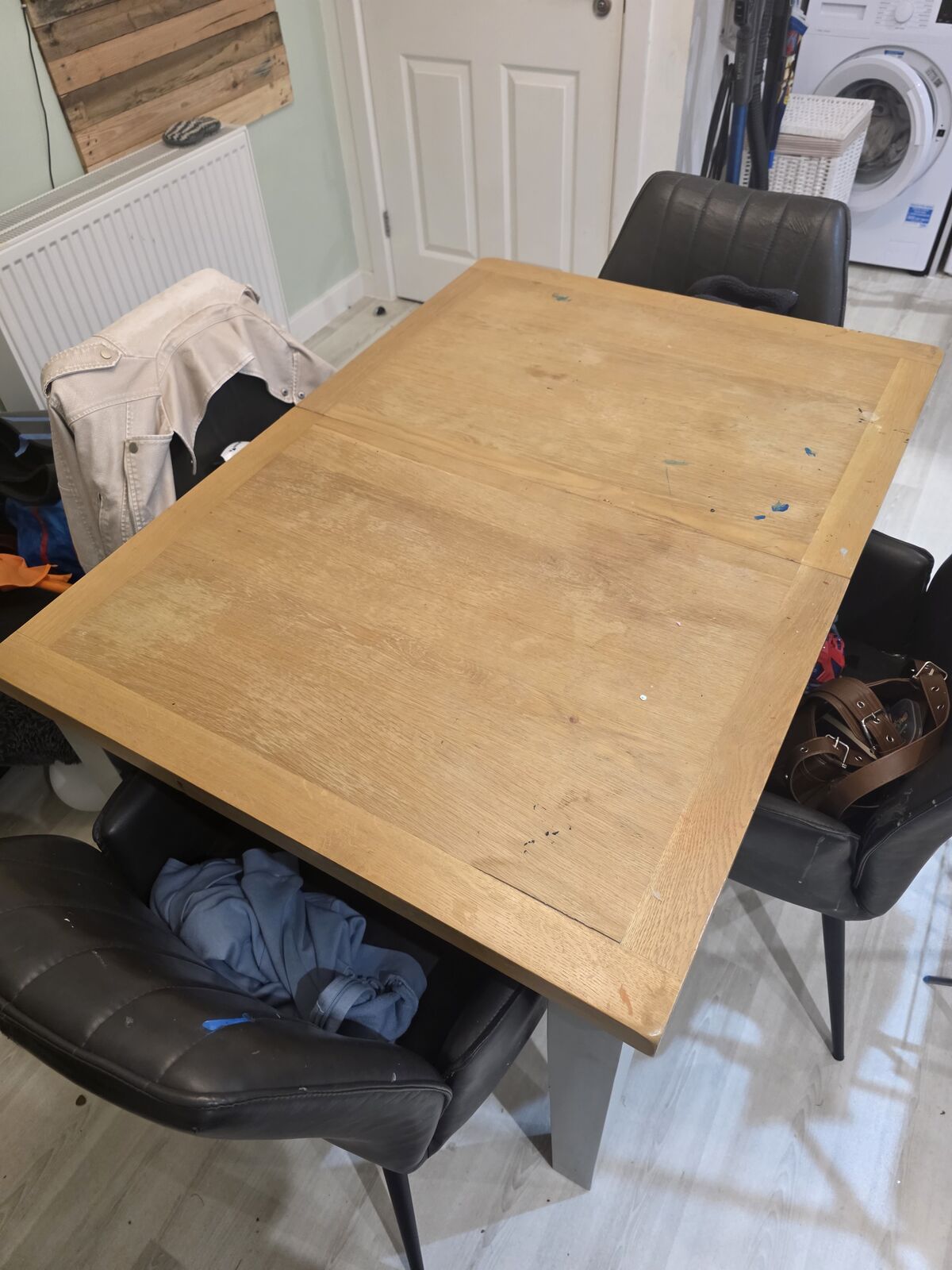 Worn oak dining table top before vinyl wrapping